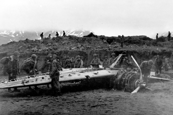 Soldiers of the 7th Infantry Division examine a wrecked  Nakajima "Rufe" float plane fighter captured on Attu.