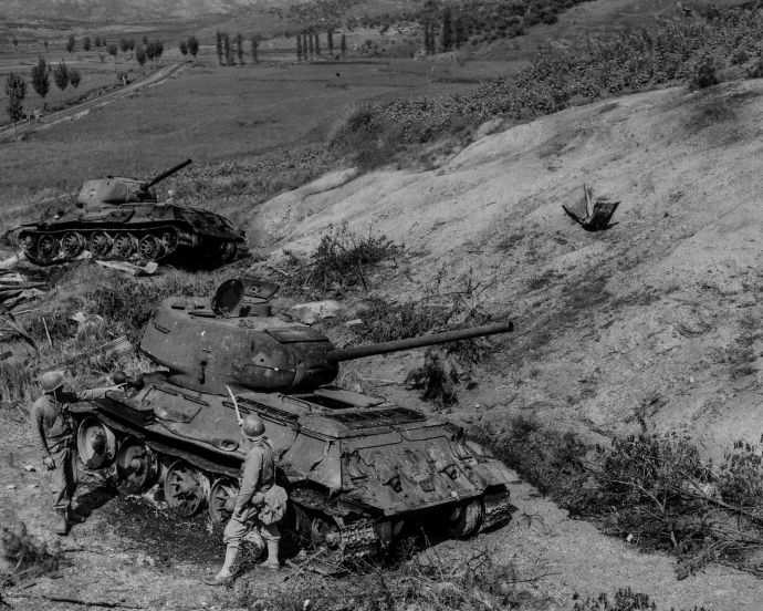 Men of the 1st Provisional Marine Brigade examine knocked out North Korean T-34 tanks during the 2nd Battle of the Naktong River, September 4, 1950.