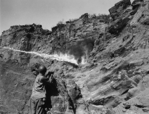147th Inf Regt Flame Thrower Attack on Japanese Cave Iwo Jima Bonin Islands 040845 (1 of 1)