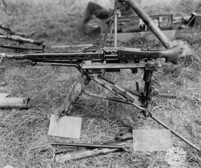 1st Army Captured German Equipment Series MG42 on tripon German heavy machine gun st clair france normandy campaign 062344 (1 of 1)